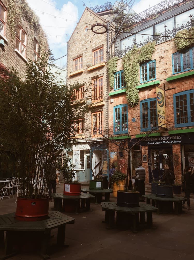 Outdoor Tables Of Cafe In Scenic Plaza