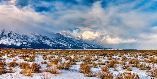 Winter Landscape with Mountains and Clouds