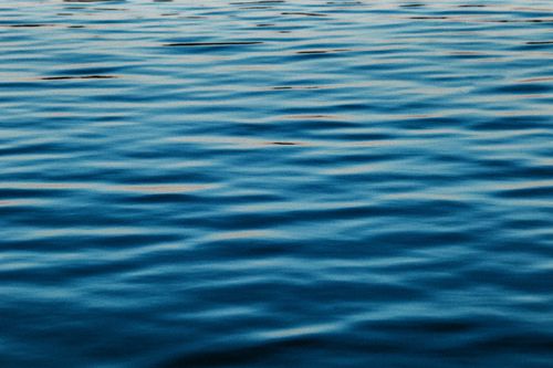 Free Scenery view of abstract background representing azure sea with flowing rippled water in daytime Stock Photo
