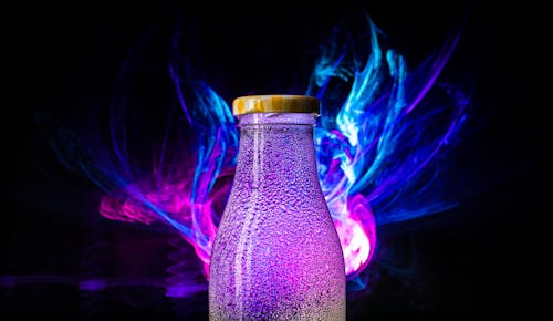 Free stock photo of against colour, glass bottle, illusion Stock Photo