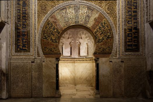Detailed view of the mihrab in the Mosque-Cathedral of Cordoba, showcasing Islamic artistry.