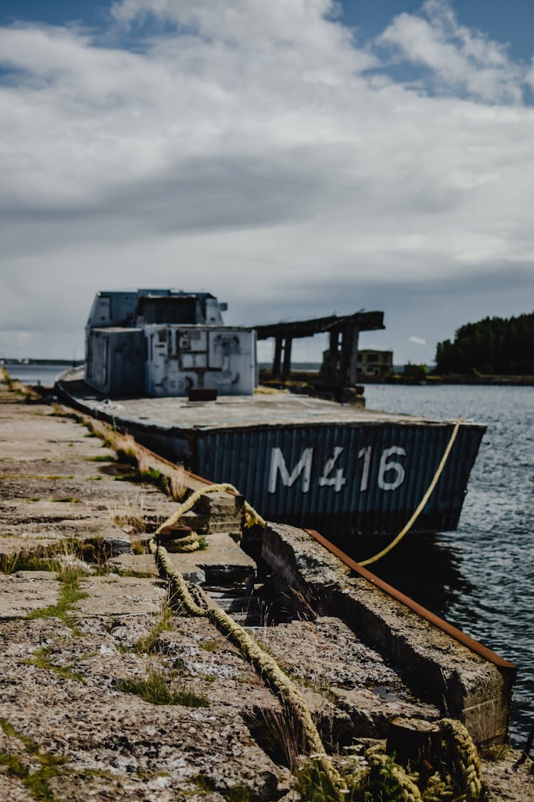 A Boat Moored On A Shore