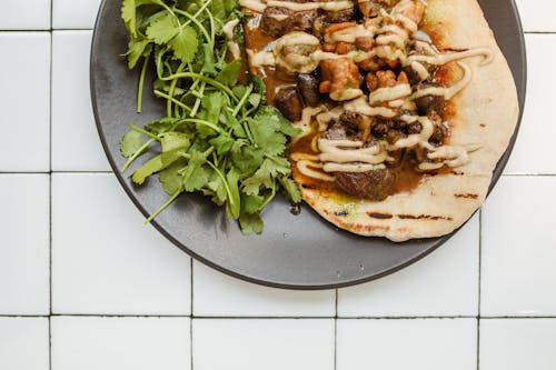 A Curry Dish over a Roti Bread