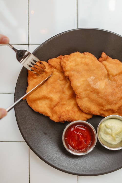 Meat Cutlet on a Black Earthenware