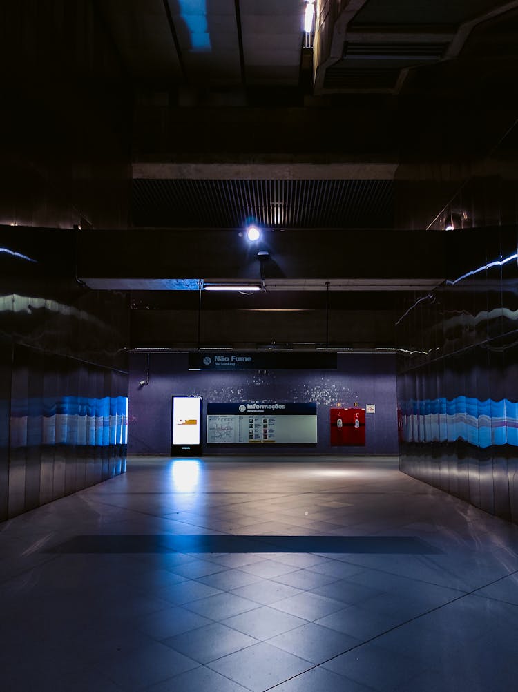 Empty Underground Passage With Shiny Walls And Modern Monitor