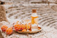 Orange and White Ceramic Teacup on White Ceramic Saucer