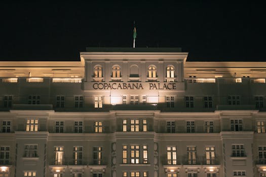 Stunning nighttime facade of the historic Copacabana Palace in Rio de Janeiro.