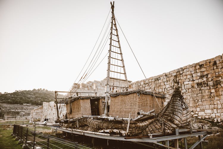 Ancient Boat Near Building