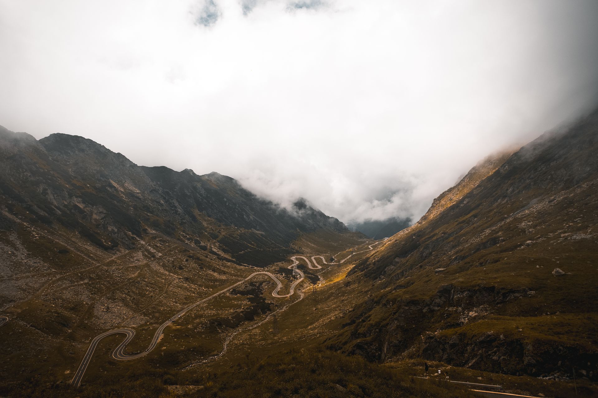 Photo: Pexels · A winding road through the mountains