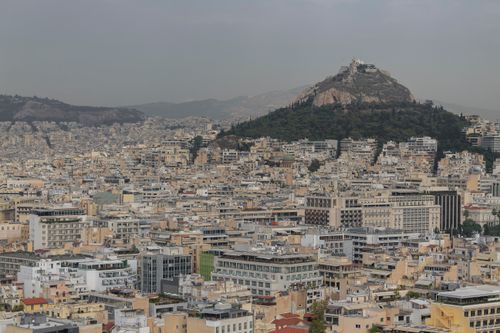 Free Expansive view of Athens featuring Mount Lycabettus, showcasing urban architecture and hilly landscape. Stock Photo