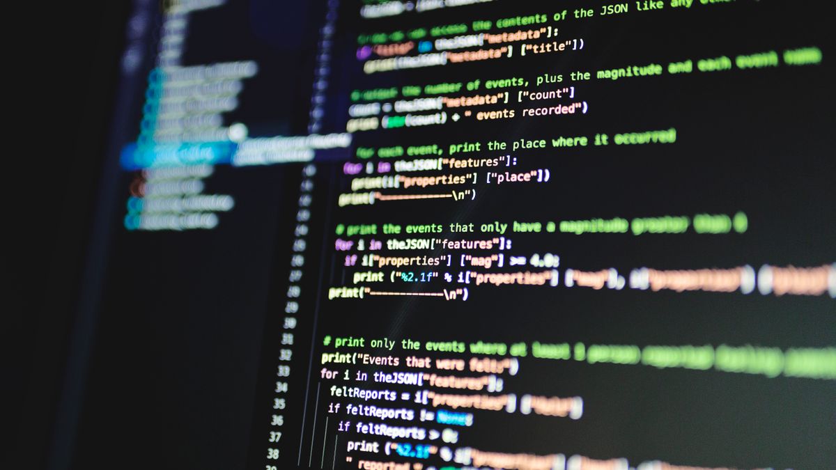 Close-up of programming code displayed on a computer monitor.