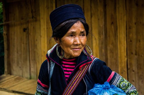 An Elderly Woman in Traditional Clothes