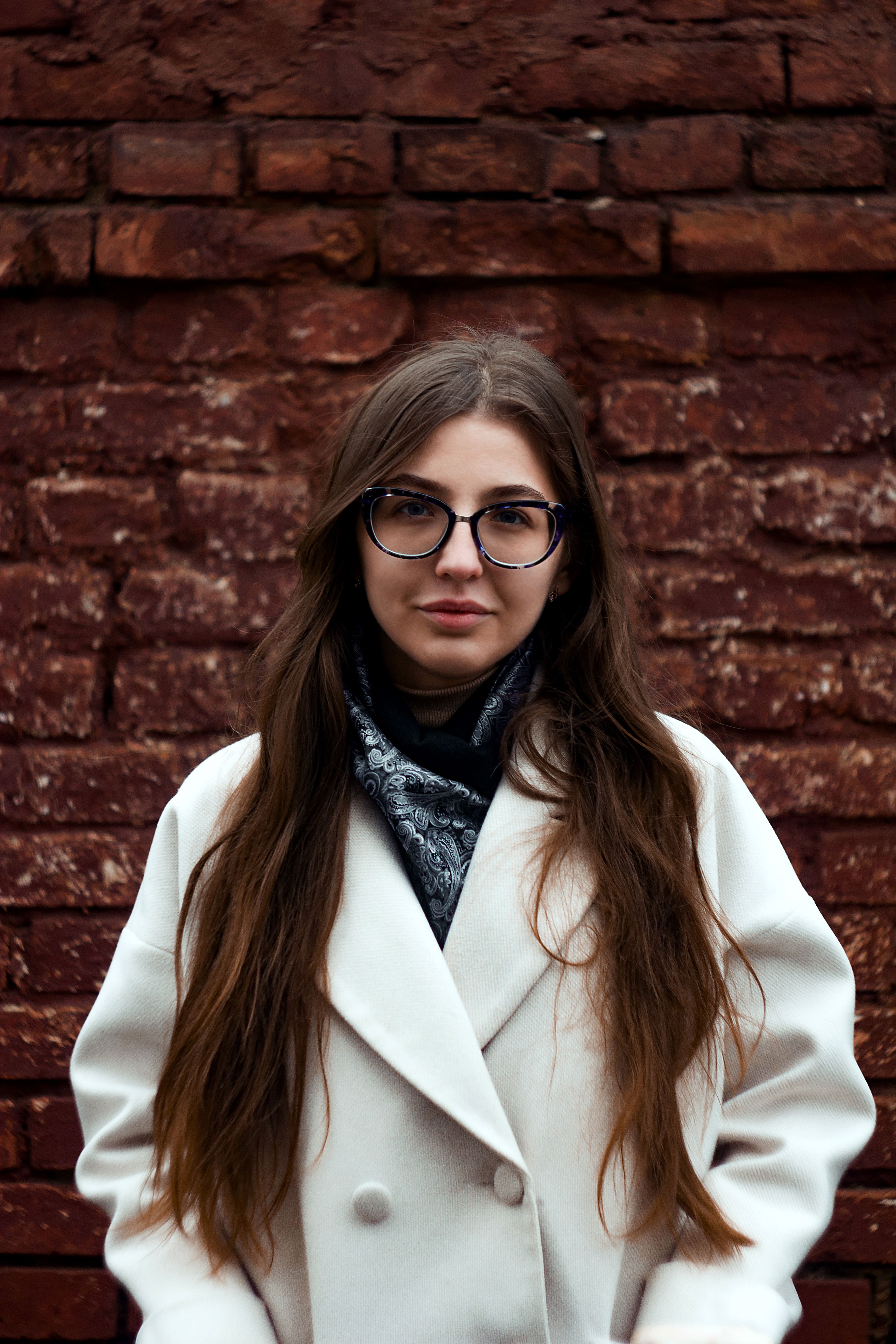 Woman in Black Coat Standing on the Alley · Free Stock Photo