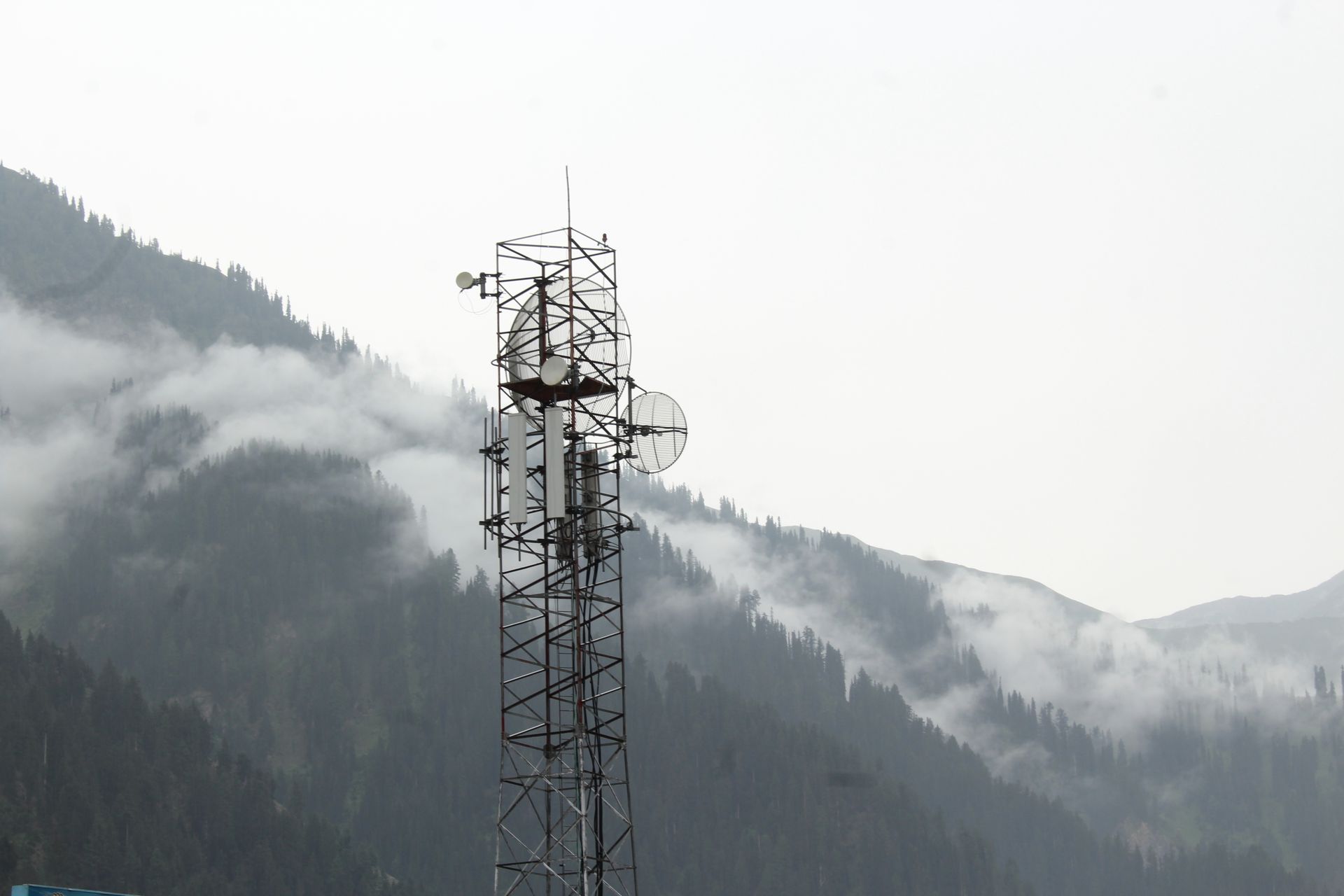 Antenna Tower Under White Clouds