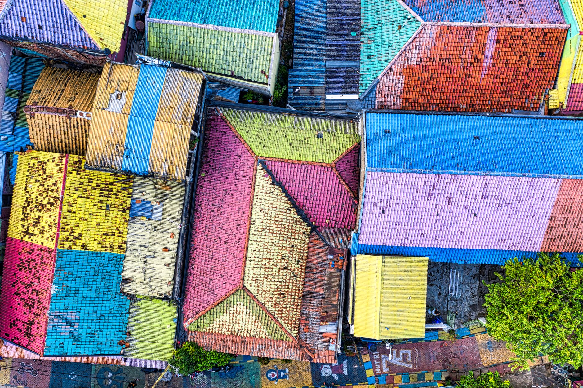 A vibrant aerial shot of colorful rooftops in Tangerang, Indonesia, highlighting urban diversity.