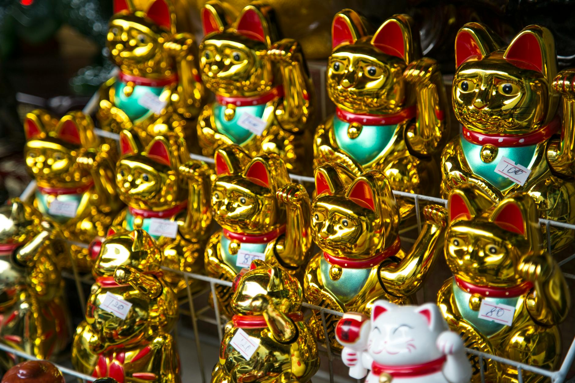 A Figurine Image of a Golden Cat for Sale
