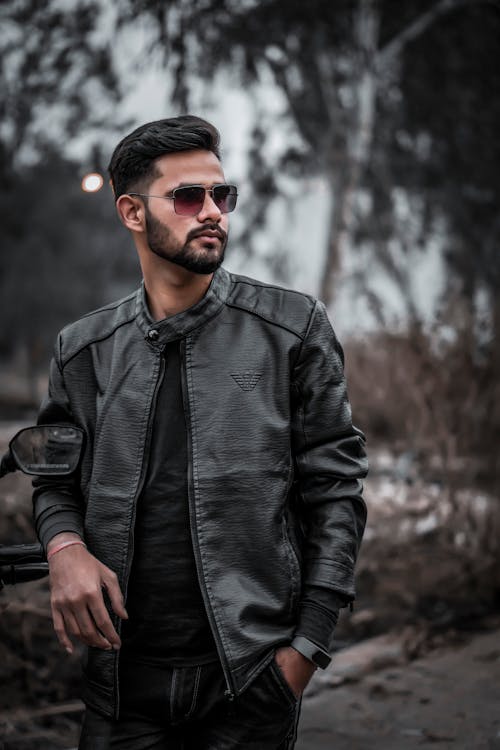 Man in Black Leather Jacket With Black Sunglasses