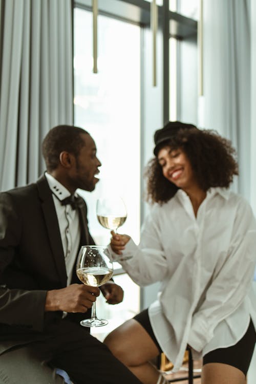 Photo of Couple Holding Wine Glasses