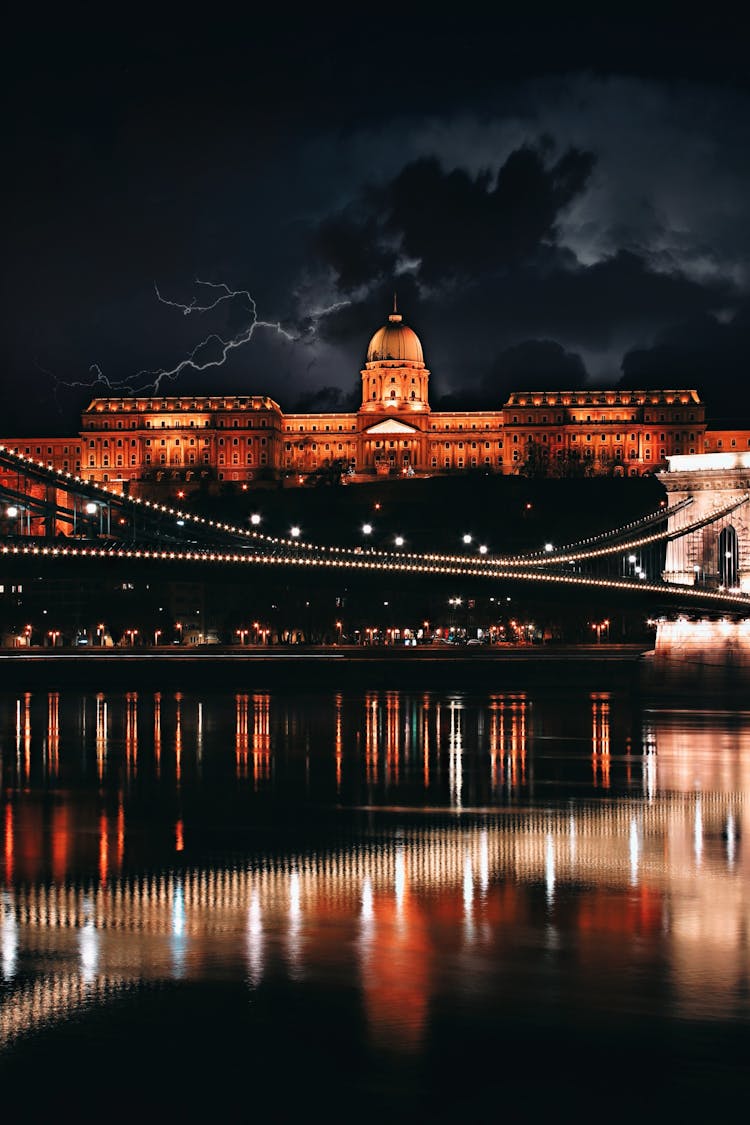 Thunderstorm Over Palace And Bridge At Night