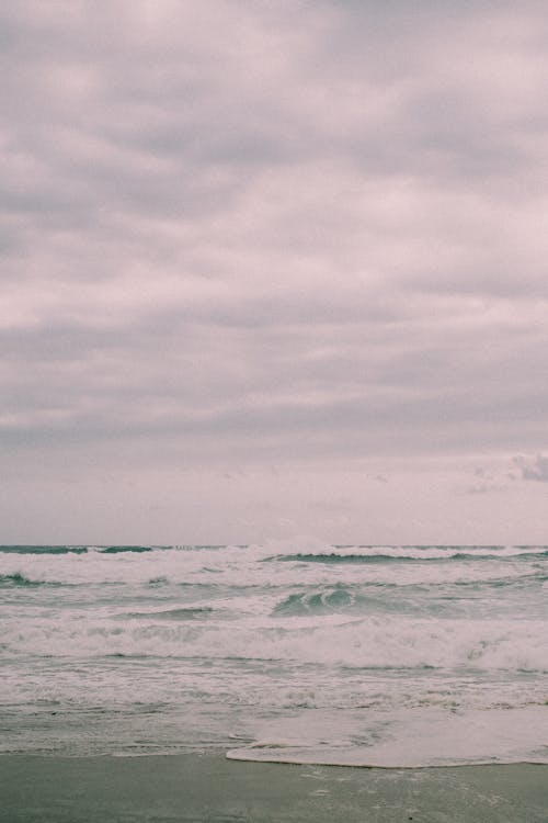 Ocean Waves under Gloomy Sky