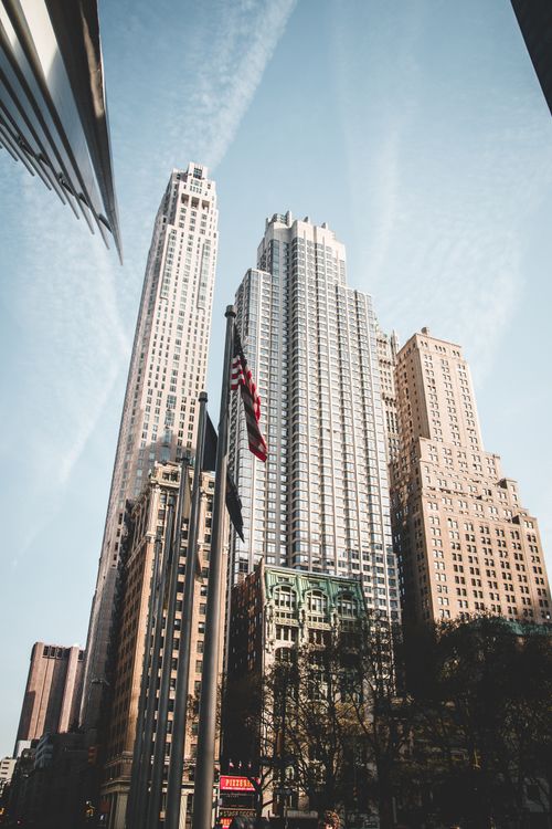 Free Stunning view of New York City's skyscrapers under a clear blue sky. Stock Photo