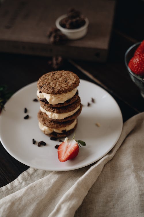 Free Stack of Cookie Sandwiches on a Plate Stock Photo