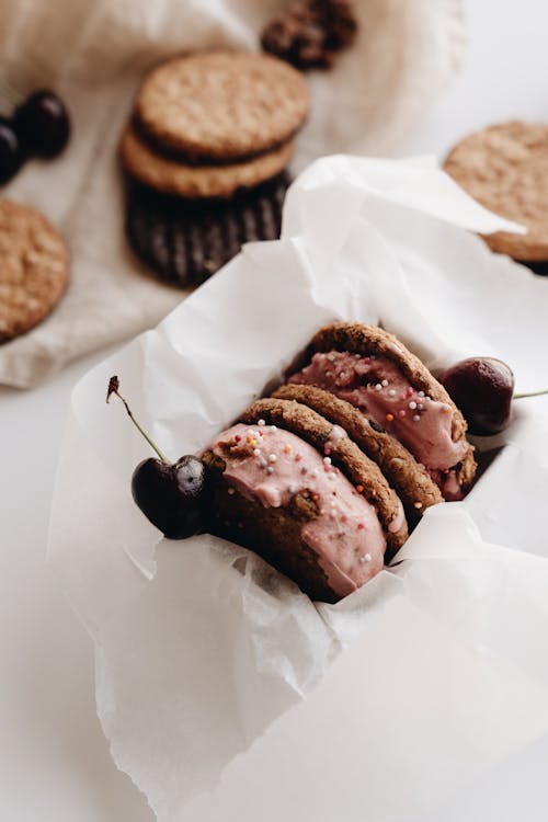 Brown Cookie Dough Sandwich with Pink Cream Filling