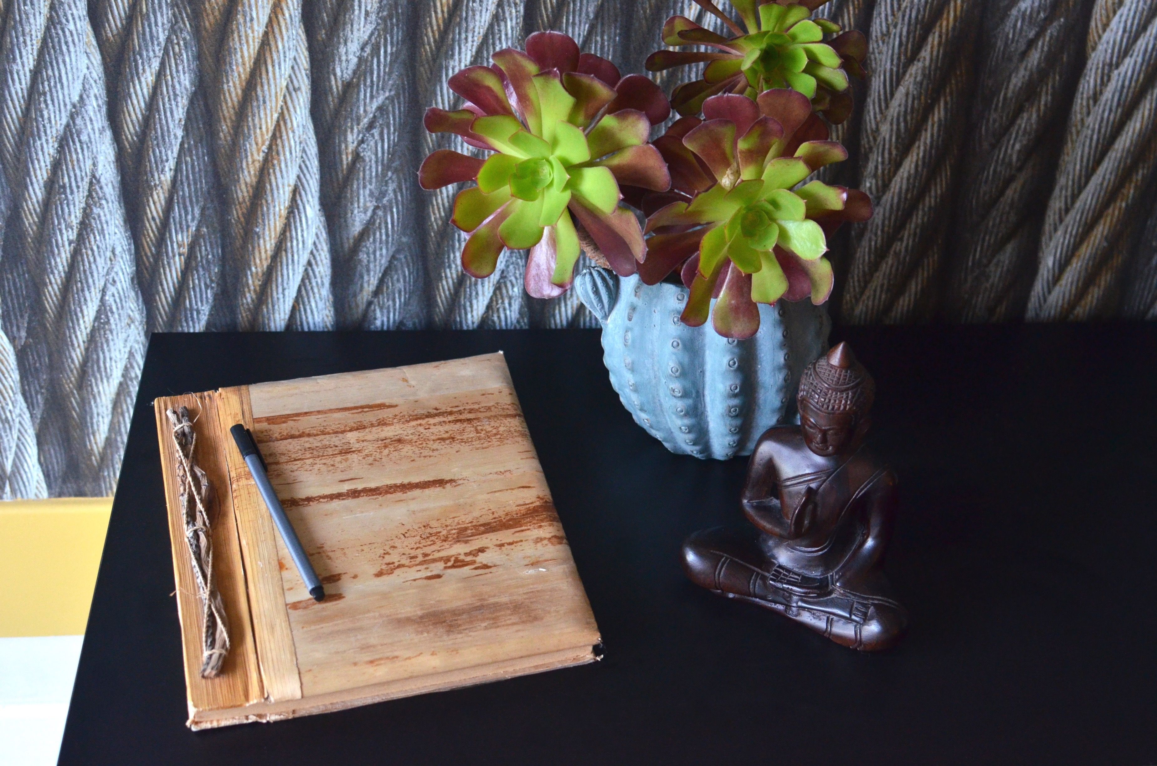 notebook and pen on desk real home lifestyle photo 2