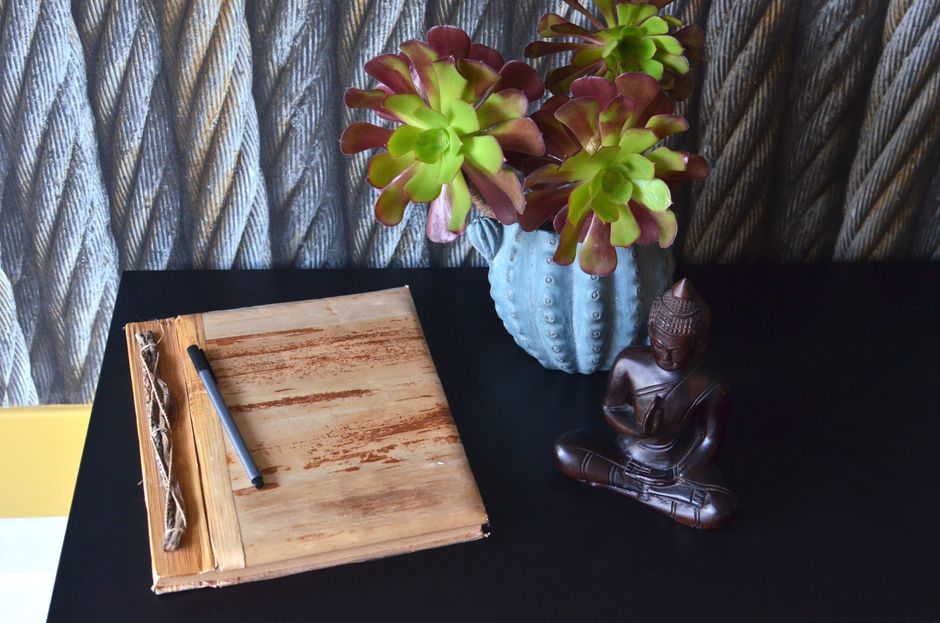 notebook and pen on desk real home lifestyle photo 2