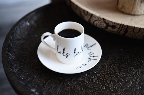 Close-Up Shot of Black Coffee in White Ceramic Mug