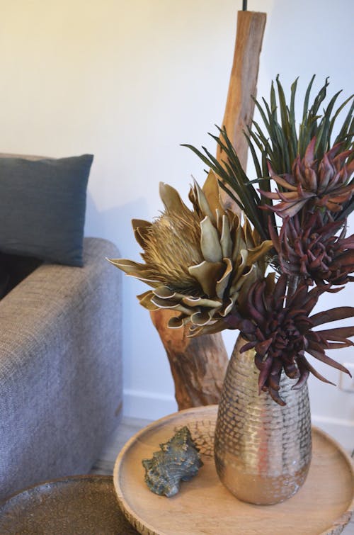 Dried Plants on a Metal Vase