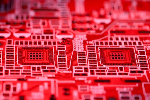 Detailed close-up of a red printed circuit board showcasing intricate electronic components and pathways.