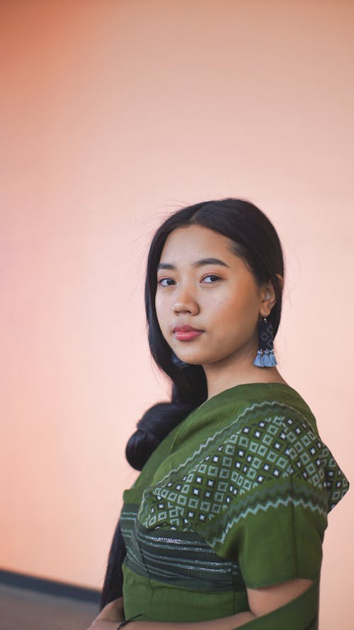 Woman in Green Traditional Clothing 