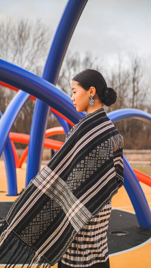 Woman in Black Traditional Clothing 