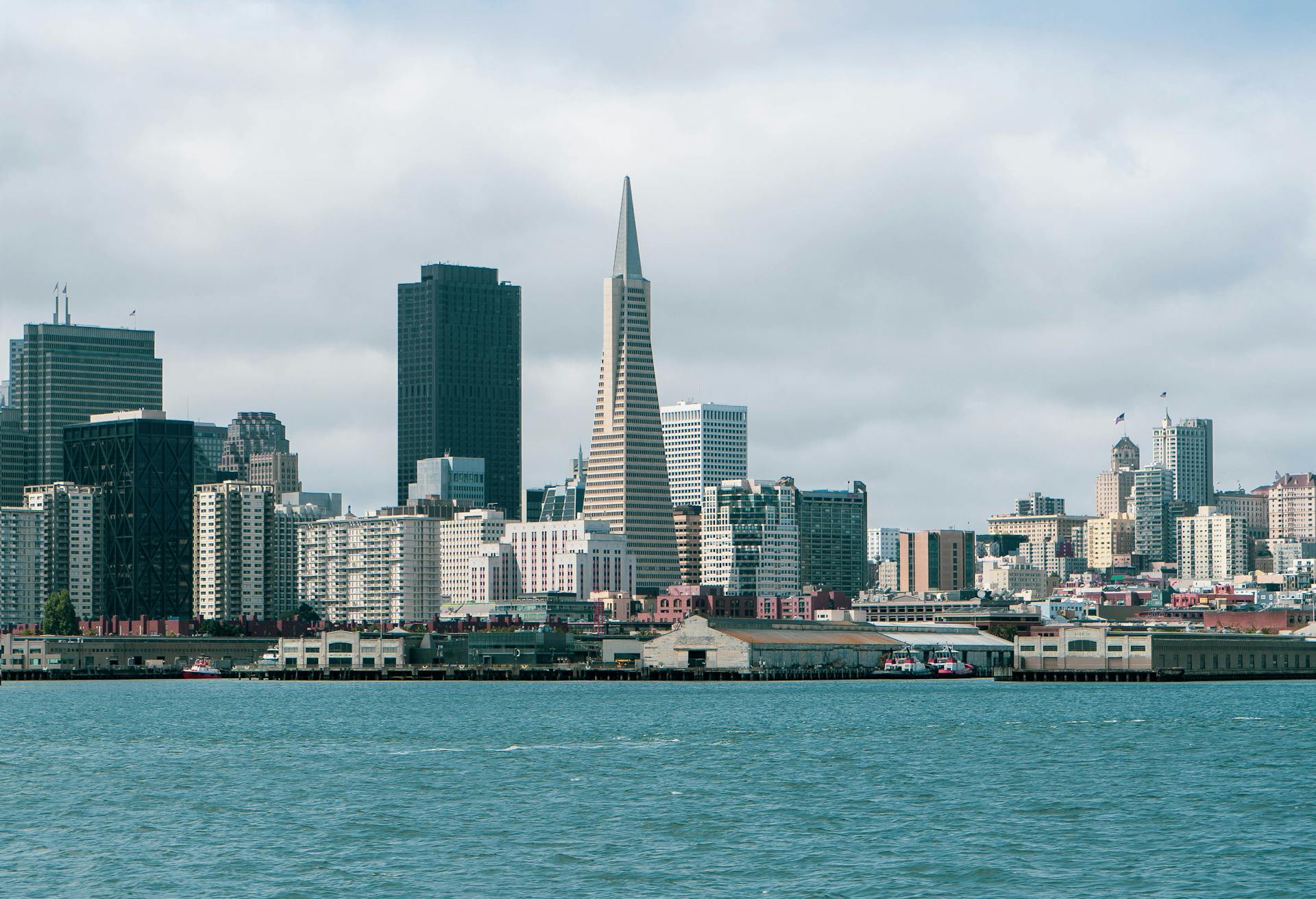 Stunning view of San Francisco skyline with iconic Transamerica Pyramid from the waterfront.