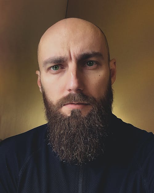 Close-up Photo of Bearded Man 