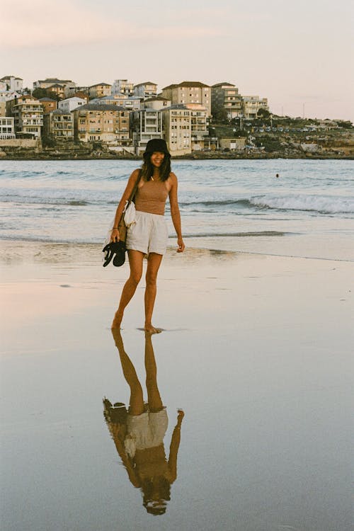 Woman Standing on Beachside