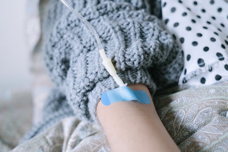 A Woman Undergoing Intravenous Therapy