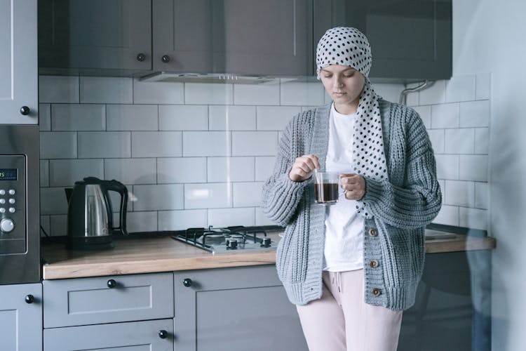 Woman Making A Coffee