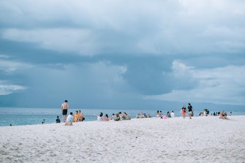 Δωρεάν στοκ φωτογραφιών με ακτή, άμμος, Άνθρωποι Φωτογραφία από στοκ φωτογραφιών