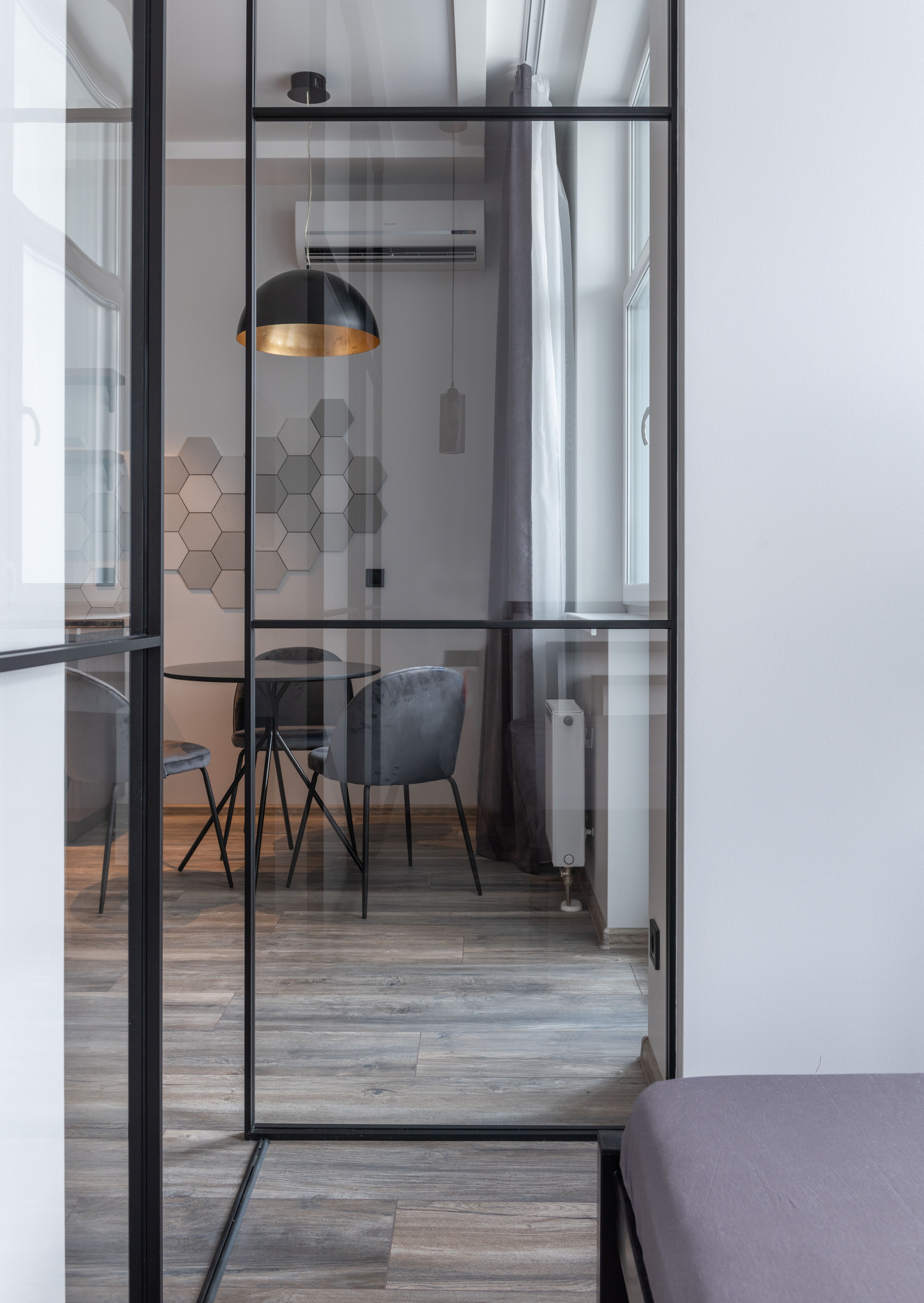 A glazed partition between living spaces at home