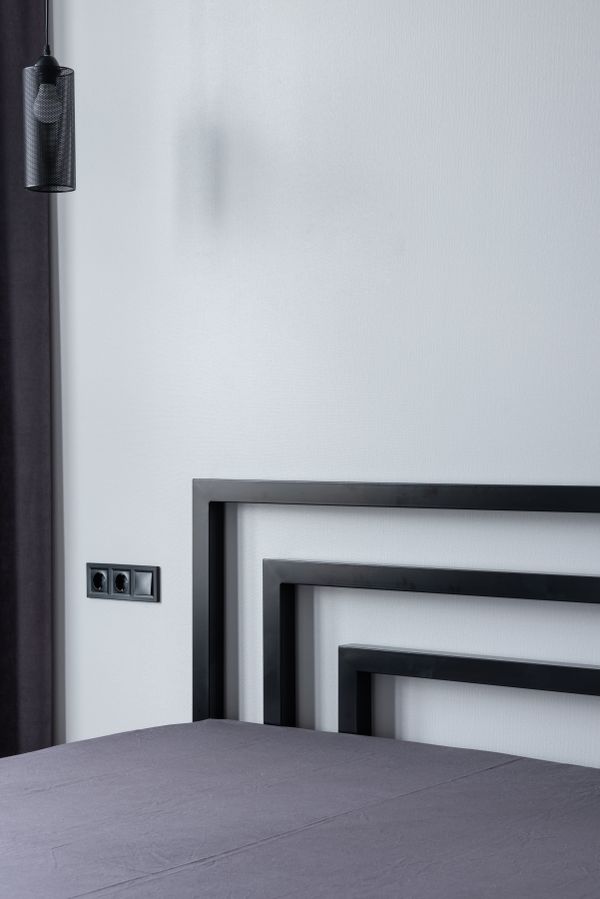 Minimal bedroom in warm greys — photo by Max Vakhtbovych on Pexels