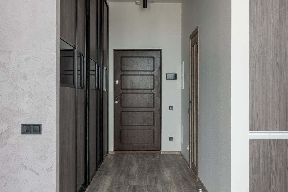 Corridor interior with entrance door at home · Free Stock Photo