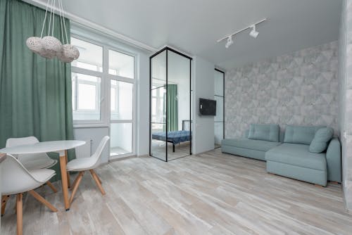 Interior of modern apartment with sofa and table