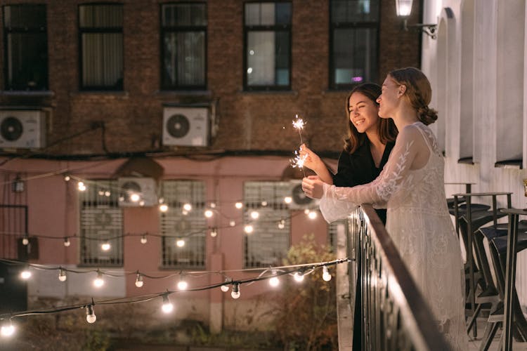 Women Holding Sparklers