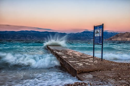 Безкоштовне стокове фото на тему «берег моря, бетонний причал, вітер»