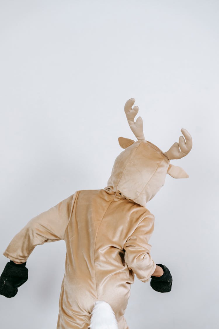 Unrecognizable Kid In Reindeer Costume