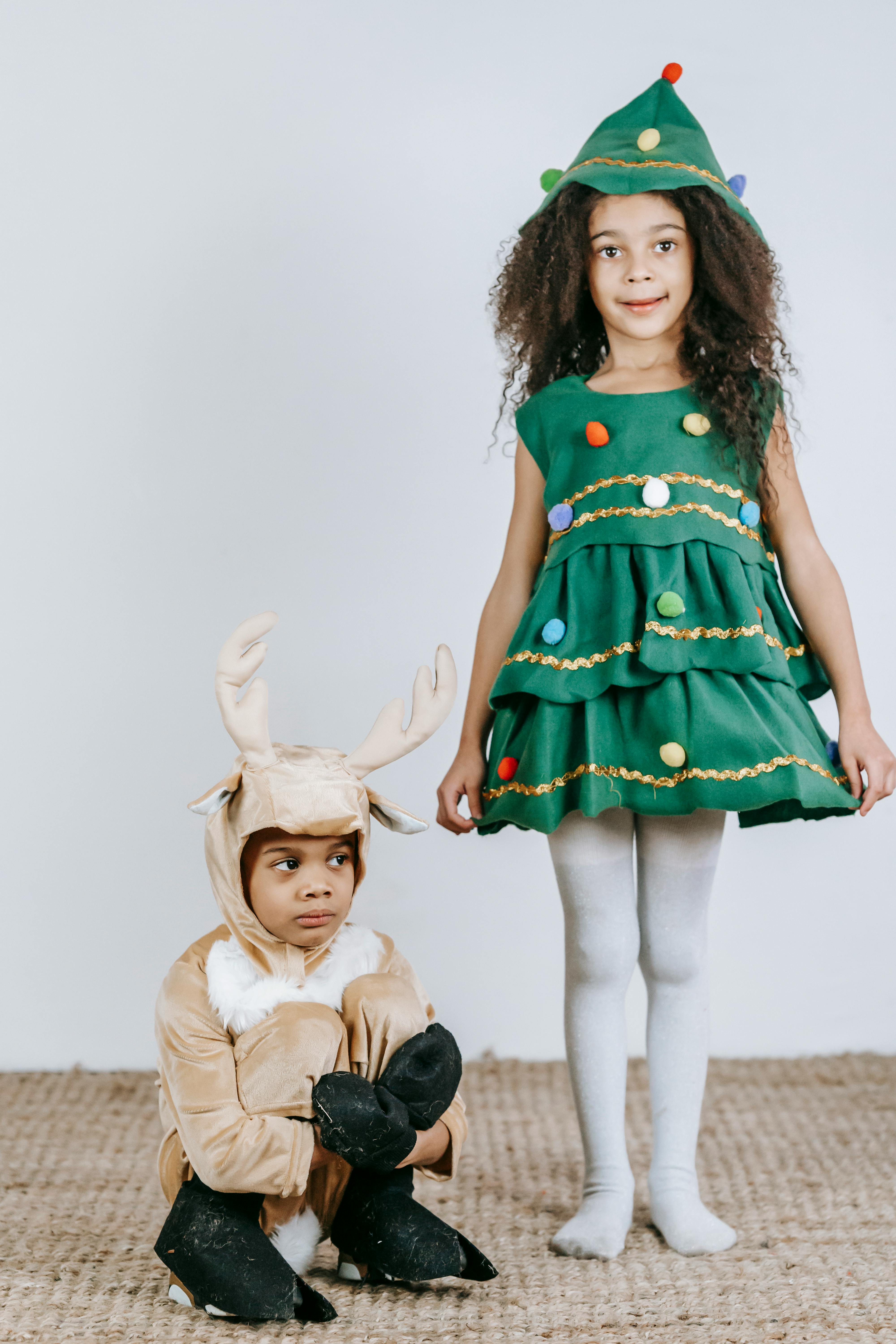 cute black children in christmas costumes