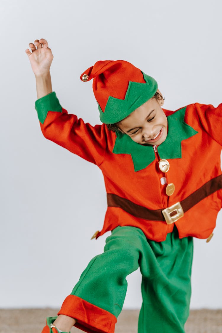 Funny Black Boy In Costume Of Elf Playing