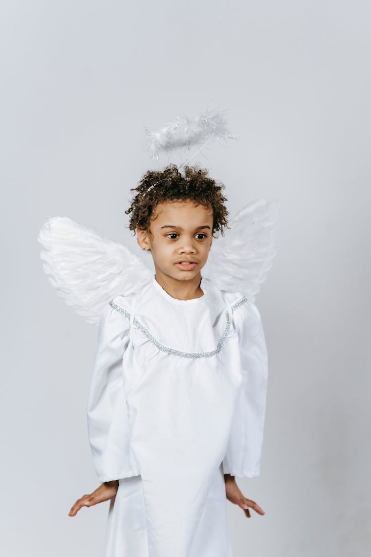 Cute Black Boy Pretending Little Angel